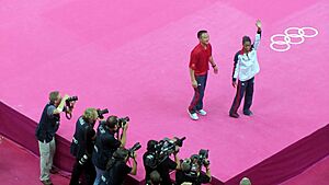 Gabrielle Douglas waving to the crowd (7738534028)