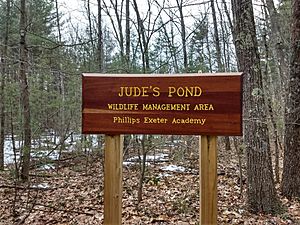 Judes pond sign Exeter NH, near memorial at water's edge