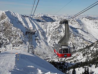 One of two cable cars composing the Aerial Tram at Snowbird Ski and Summer Resort approaches the top station on top of Hidden Peak at an elevation of 11,000 feet