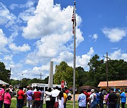 Kentwood residents observe a noontide Day of Prayer in front of the Town Hall in 2015