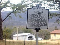 Historical marker in Captain, detailing the history of the town name