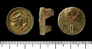 Incomplete cast copper alloy gilt button brooch of Early Early-Medieval date (AD 475 – AD 550). (FindID 108518)