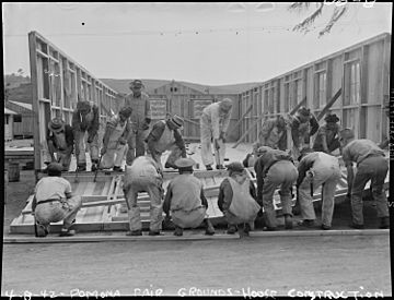 Pomona, California. Constructing temporary quarters for evacuees of Japanese ancestry on Los Angele . . . - NARA - 536839
