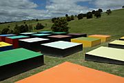 Colorful cube sculptures by Leon van den Eijkel