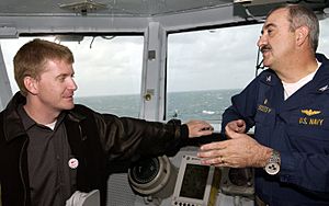 US Navy 031210-N-5319A-007 NASCAR driver Jeff Burton talks with Captain Martin J. Erdossy, Commanding Officer, USS George Washington (CVN 73) on the flag bridge, during a visit aboard the aircraft carrier