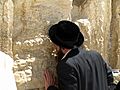 A man prays at the Western Wall in Jerusalem