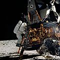 Astronaut Alan L. Bean is about to step off the ladder of the Lunar Module
