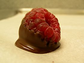 Chocolate-dipped raspberry