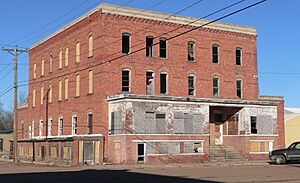 Geddes, South Dakota, building NW corner 3rd and Main from SE 1