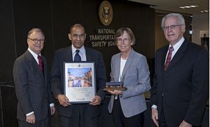 NTSB Chairman Christopher Hart, Board Members Robert Sumwalt, and Earl Weener together with TSB Chair Kathy Fox representing international collaboration to help improve transportation safety
