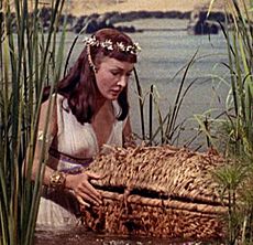 Nina Foch holding Moses' basket in The Ten Commandments trailer (cropped)