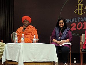 Swami Agnivesh (left) at an Amesty Event in New Delhi. Teesta Setalvad (right) also pictured