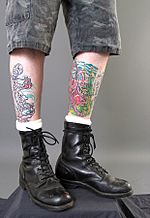 Combat boots worn as fashion apparel