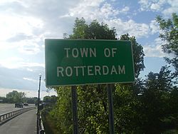 A sign depicting the entrance to town of Rotterdam on New York State Route 5