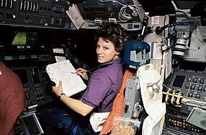 Astronaut Eileen Collins at the Pilot's Station on Shuttle Discovery