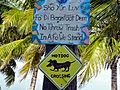 Creole Notice and Roadsign - Caye Caulker, Belize