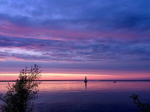 Escanaba harbor lighthouse at sunset