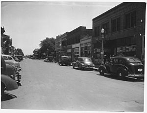 Photograph with caption "'View Looking East on First Street in Hastings, Nebraska." - NARA - 283495
