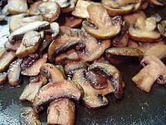 Close-up view of sautéed baby bella mushrooms