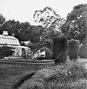 StateLibQld 1 85092 Children posing with the Armstrong gun in the Toowoomba Botanic Gardens, 1912