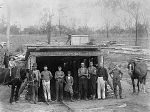 StateLibQld 1 85764 Miners outside the Garrick Tunnel, Bowen Consolidated Coal Mines, ca. 1920