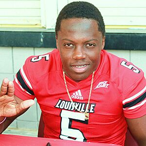 Teddy Bridgewater poses for fan day