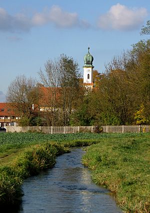 Unterbiberg with the church of St. Georg and the Hachinger Bach
