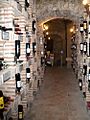 Bottles of Wine in an Underground Wine Cave in Aranda de Duero, Spain