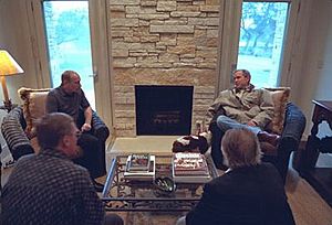 George W Bush and Vladimir Putin by Limestone fireplace at Texas White House in Crawford Texas