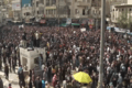Large street demonstration, with speakers addressing the crowd