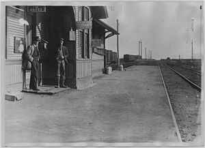 Men on railroad station platform. Hastings, Oklahoma - NARA - 283744
