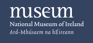 The word "museum" in stylised lower-case text, with the name of the museum in Irish and English below.