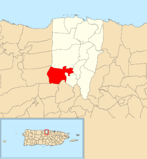 Location of Pugnado Adentro within the municipality of Vega Baja shown in red