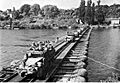 3rd Armored Division vehicles cross the Seine River