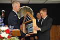 Commander presents flag to Missouri governor