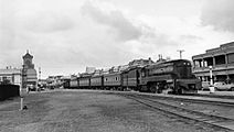 Ellen Street station and passenger train headed by SAR loco 522, Port Pirie, early 1950s (NRM AZ04913).jpg