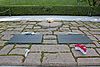 Graves of John F. and Jackie Kennedy in Arlington National Cemetery.jpg