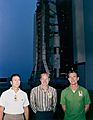 Jim Irwin (left) Al Worden, and Dave Scott pose in front of the VAB during the Saturn V roll-out