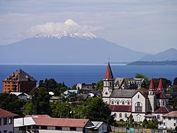 View of Puerto Varas with Osorno Volcano and Llanquihue Lake in the background.