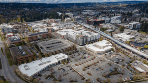 Aerial view of Downtown Redmond as seen from the southeast with several apartment buildings and an elevated trackway.