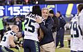 Richard Sherman and Pete Carroll in embrace Super Bowl XLVIII