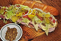 Submarine sandwich with toppings and dijon mustard.jpg