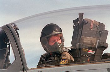 A close up of 1st Lt. Jeannie Flynn, the first F-15E female pilot, sits in the cockpit as she performs engine start F-3530-SCN-95-000045-xx-0037