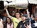 Andrew Ference lifts Stanley Cup during parade