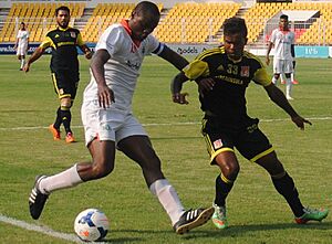 Odafa Okolie of Sporting Clube de Goa in action against Pune FC during an I-League match at the Fatorda Nehru Stadium in Margao, Goa, May 2015
