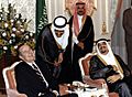 President George H. W. Bush and King Fahd bin Abdulaziz Al Saud share a laugh