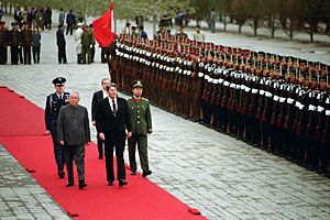 President Ronald Reagan reviews troops during an arrival ceremony at Great Hall of the People in Beijing Peoples Republic of China