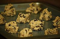 Raw cookie dough in cookie clumps