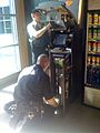 Two Loomis Employees Refilling an ATM at the Downtown Seattle REI