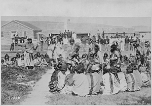 "Shoshone Indians at Ft. Washakie, Wyoming Indian reservation .. . Chief Washakie (at left) extends his right arm" - NARA - 530919